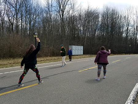 people walking Kendal's perimeter road
