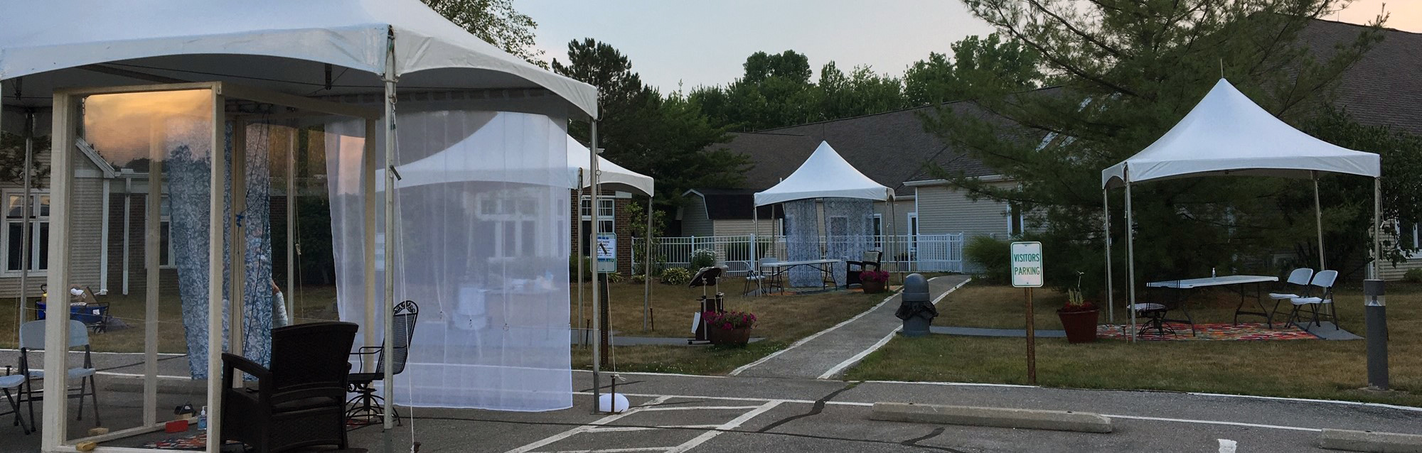 visitor tents at sunset