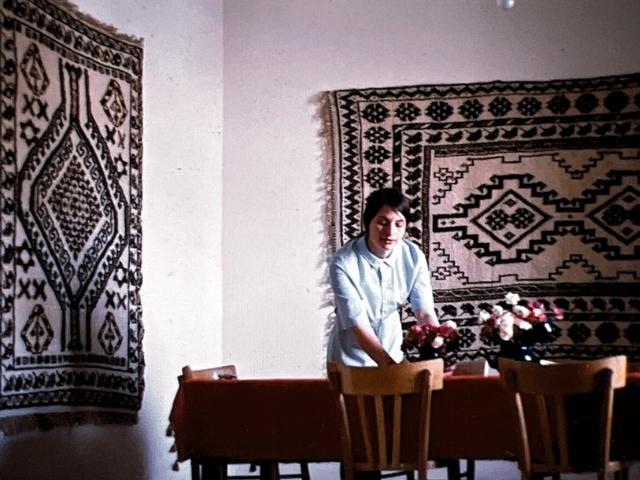 Nan setting table with flowers 