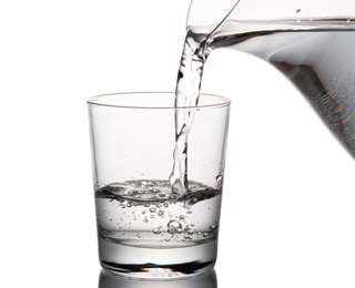 water being poured into a glass